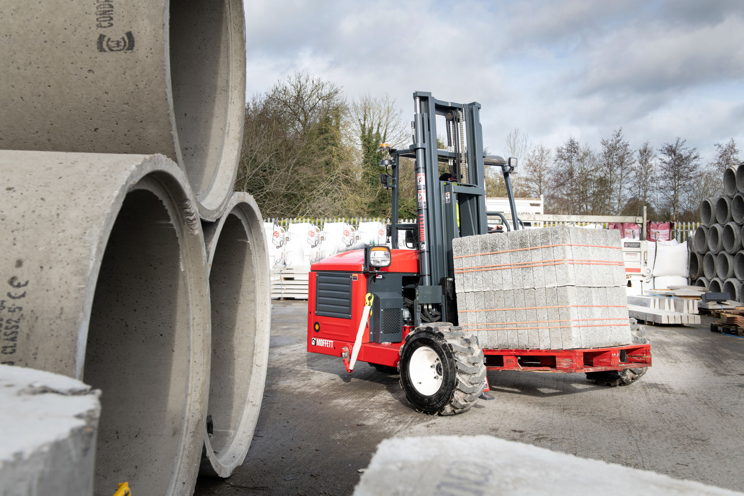 MOFFETT forklift carrying building materials